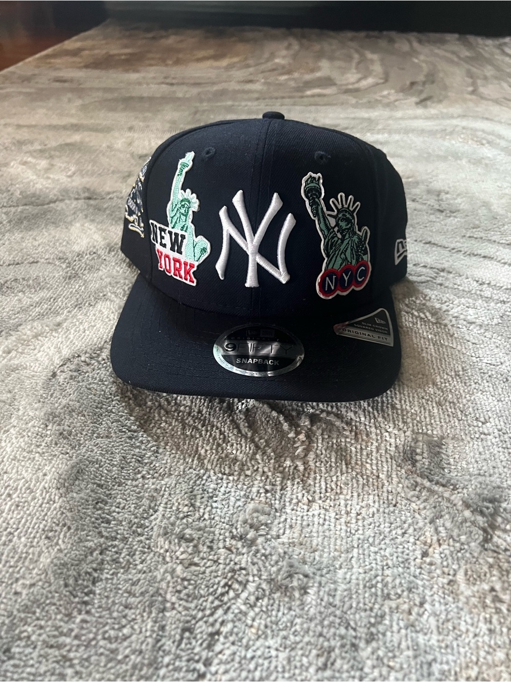 New Era mens New York Yankees navy Snapback Hat with Statue of Liberty Patches